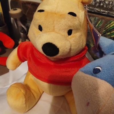 Winnie the Pooh and Eeyore stuffed animals