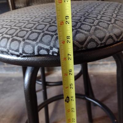 Three Swiveling Bar Stools with Upholstered Seats