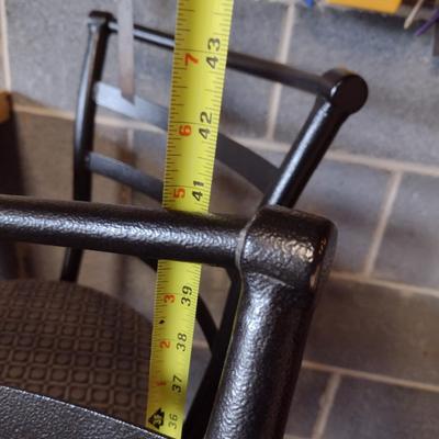 Three Swiveling Bar Stools with Upholstered Seats