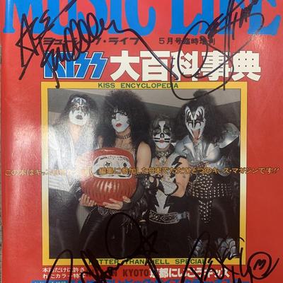 KISS Music Life signed tour book. GFA forensic authentication 