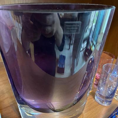 L15- purple vases, multicolor glasses, and ornament