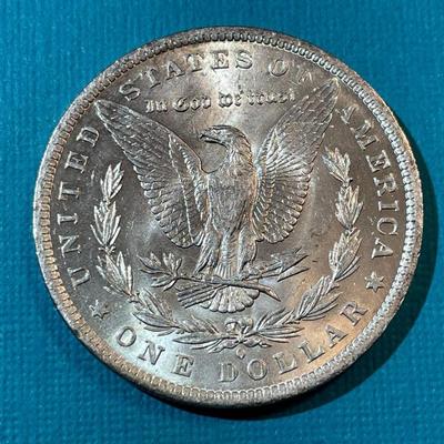 1884-O BU CONDITION MORGAN SILVER DOLLAR AS PICTURED.