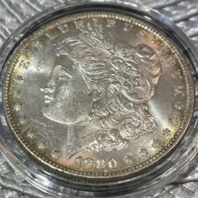 1880-P UNCIRCULATED CONDITION MORGAN SILVER DOLLAR AS PICTURED.