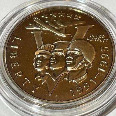 1993 P World War II 50th Anniversary Proof Commemorative Half Dollar in a Mint Capsule.