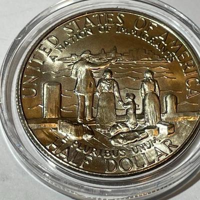1986-D CHOICE BU Statue of Liberty Commemorative Half Dollar in a Mint Capsule.