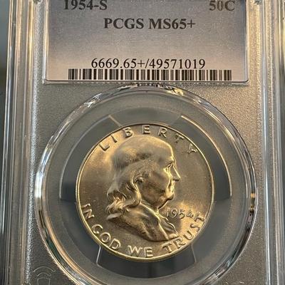 PCGS Certified 1954-S MS65+ Blast White Franklin Silver Half Dollar.