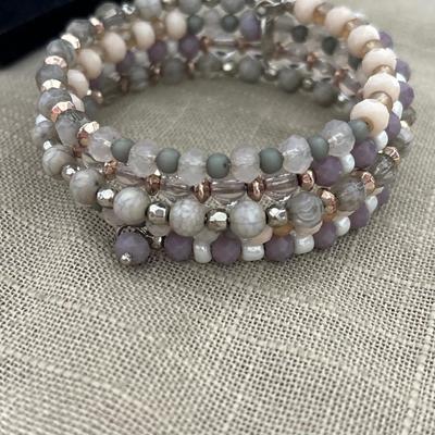 Pink, purple, gray and white wire wrap around bracelet beaded