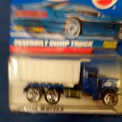 LOT 123 LOT OF NINE HOT WHEELS TRUCKS