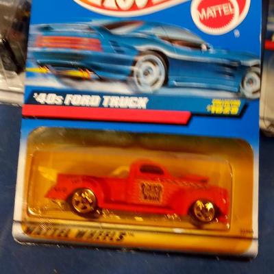 LOT 123 LOT OF NINE HOT WHEELS TRUCKS