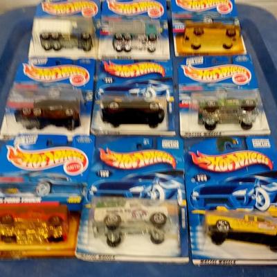 LOT 123 LOT OF NINE HOT WHEELS TRUCKS