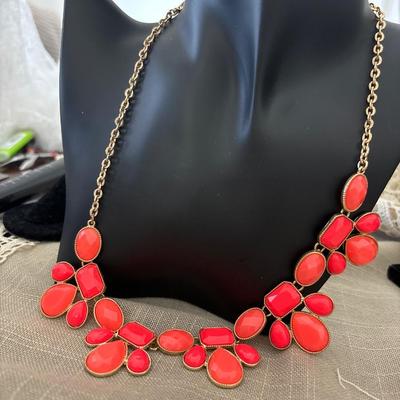 Pink and coral statement gold tone necklace
