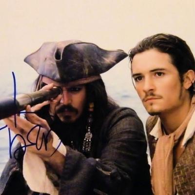 Johnny Depp signed Pirates of the Caribbean movie photo 