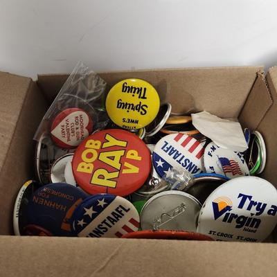 Box of vintage political pins