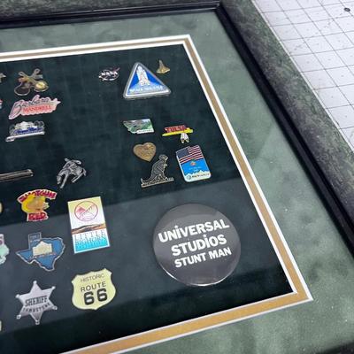 Another Collection of Pins, framed; Dinosaur, Panda and The Little Big Horn 