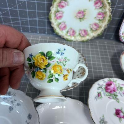 Several China Saucers and a Few Cups