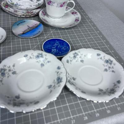 Several China Saucers and a Few Cups