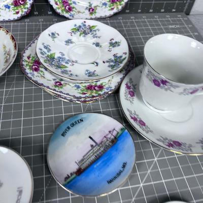 Several China Saucers and a Few Cups