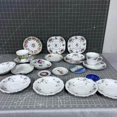 Several China Saucers and a Few Cups