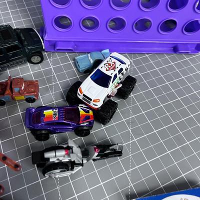 Die Cast Cars and Plastic Spiders 