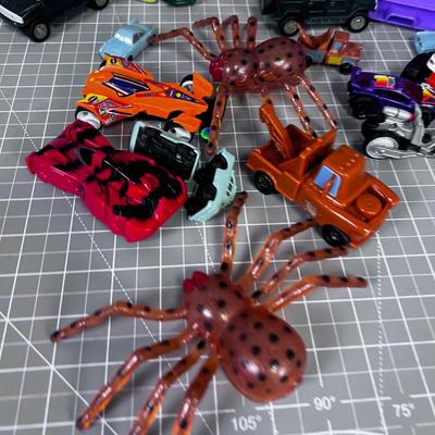 Die Cast Cars and Plastic Spiders 