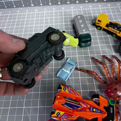 Die Cast Cars and Plastic Spiders 
