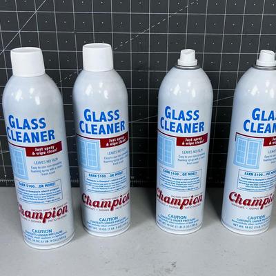 (3) Full Bottles and 1 Partial  Champion Glass Cleaner 