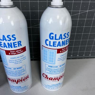 (3) Full Bottles and 1 Partial  Champion Glass Cleaner 