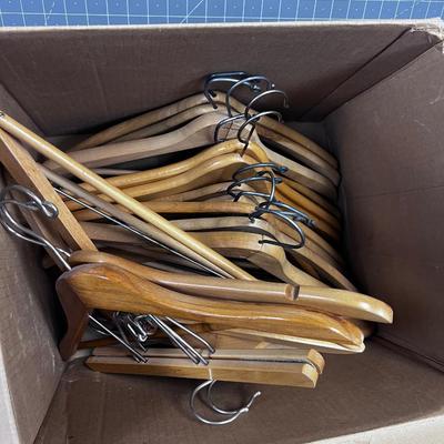 Box Full of Wood Hangers 