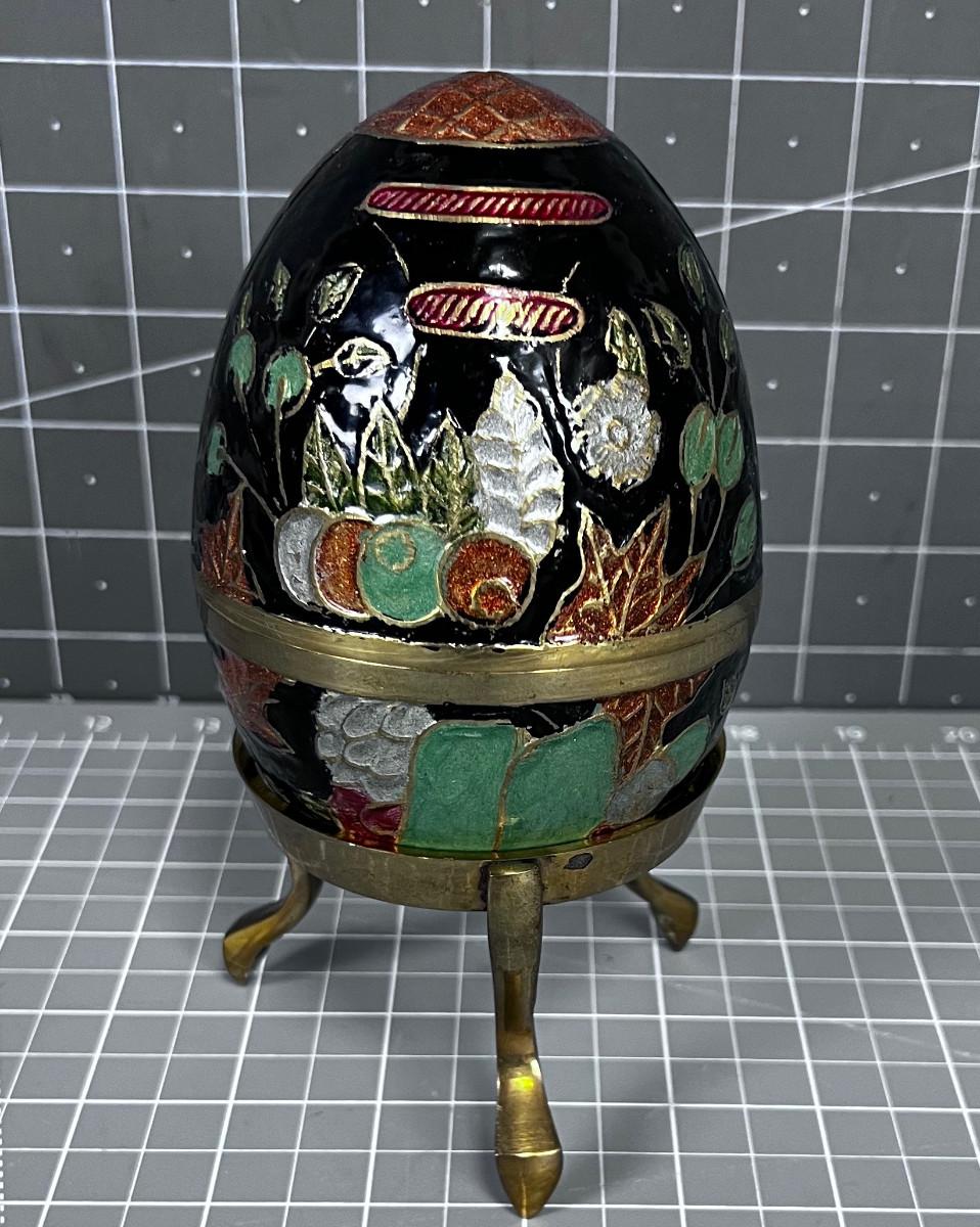 Enamel over Brass Egg with Stand | EstateSales.org