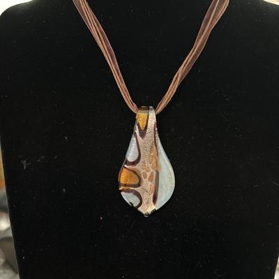 Handblown glass pendant with ribbon