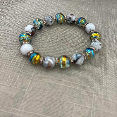 Blue and yellow with cow print beaded stretchy bracelet