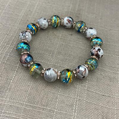 Blue and yellow with cow print beaded stretchy bracelet