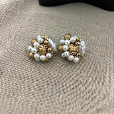Vintage Japan gold toned white clip on earrings
