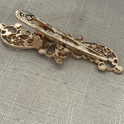 Gold toned vintage hair clip