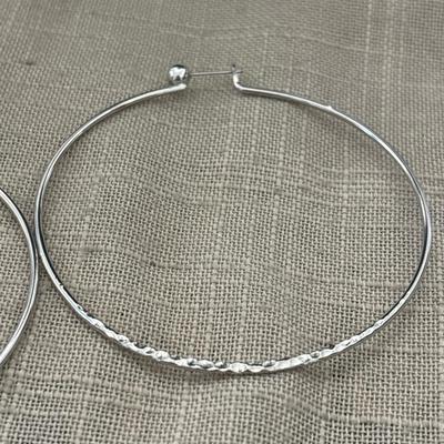 Silver tone hoop earrings