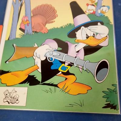 LOT 131 THREE WALT DISNEY COMIC BOOKS