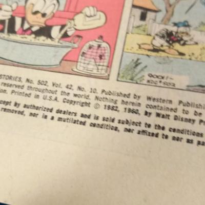 LOT 131 THREE WALT DISNEY COMIC BOOKS