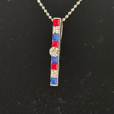 Red white and blue blue crystal pendant, silver tones chain necklace