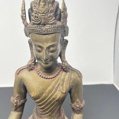 Antique Thai Gilt bronze seated Buddha figurine.