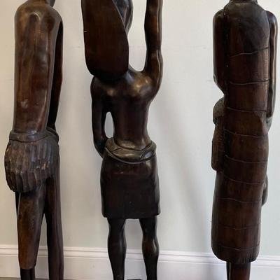 Three Tall Robust Wood African Statues