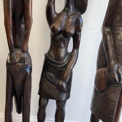 Three Tall Robust Wood African Statues