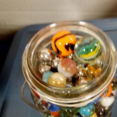 LOT 134 OLD JAR OF MARBLES