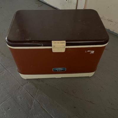 PROPANE STOVE, METAL COOLER, FISHING POLE W/REEL, TACKLE BOX AND RUBBER BOOTS