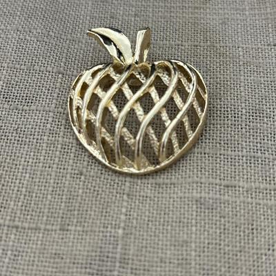 Gerry’s gold tone apple pin