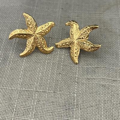 Gold toned starfish earrings