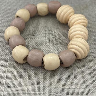 Tan and light brown beaded wooden bracelet