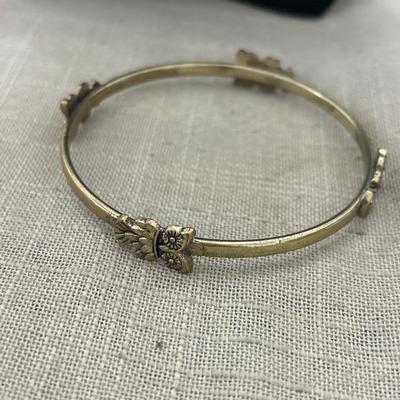 Gold tone owl bangle