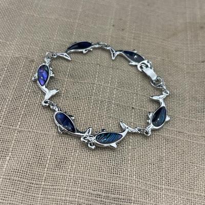 Small silver tone blue dolphin bracelet