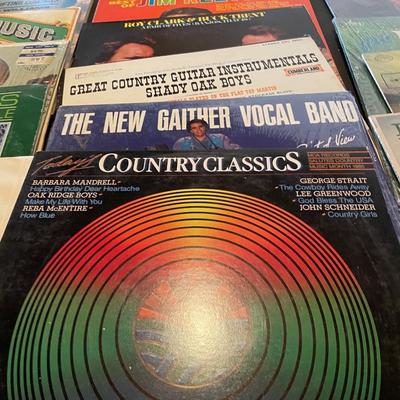 AN ASSORTMENT OF MUSIC ON VINYL RECORDS