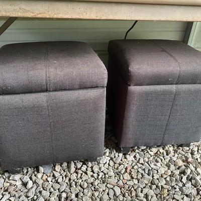 Set of black storage ottomans